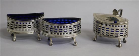 An Edwardian pieced silver three piece condiment set, Birmingham, 1904.